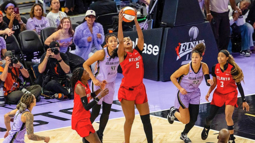 WNBA Finals Clash: Activist Booed Over Controversial T-Shirt